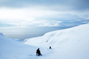 Snowmobiling in Spitsbergen