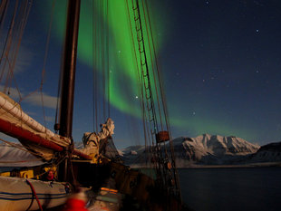Sailing Boat under Northern Lights in Norway, Jan Belgers